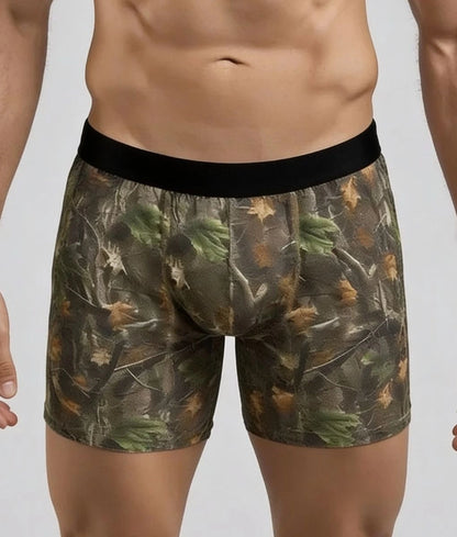 Model wearing WoodLand camo boxer brief, close front view of fit