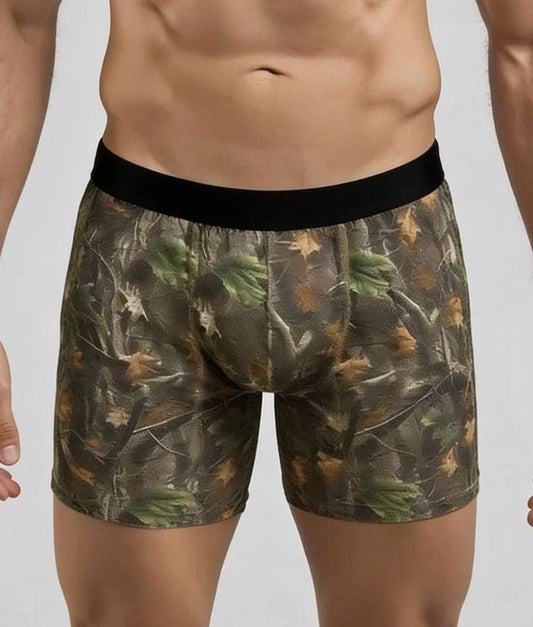 Model wearing WoodLand camo boxer brief, close front view of fit