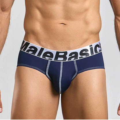 Men's stretch microfiber brief in navy, front view on model