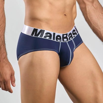 Men's stretch microfiber brief in navy, three-quarter side view showing seam detail