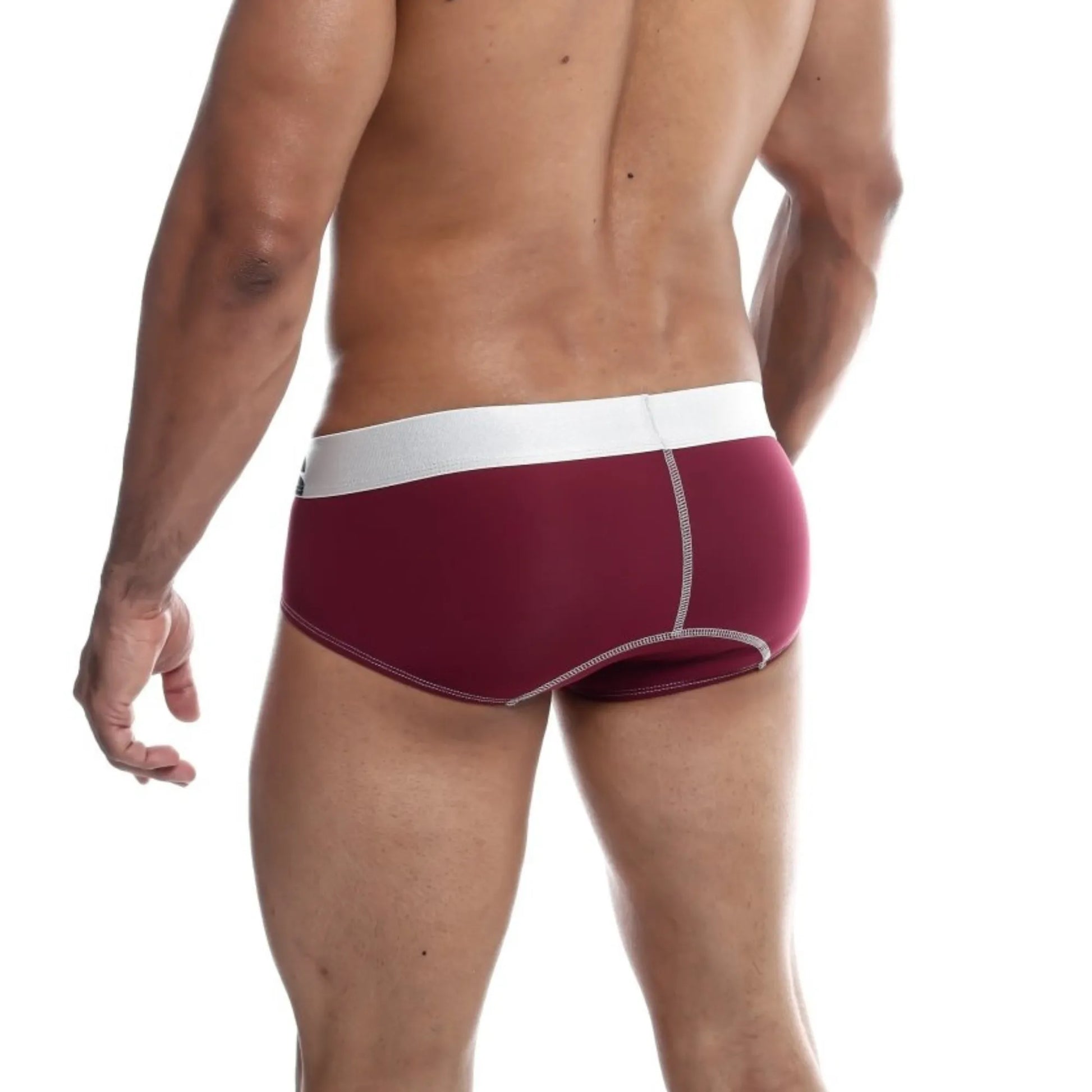 Men's stretch microfiber brief in burgundy shown full-length on model, back view