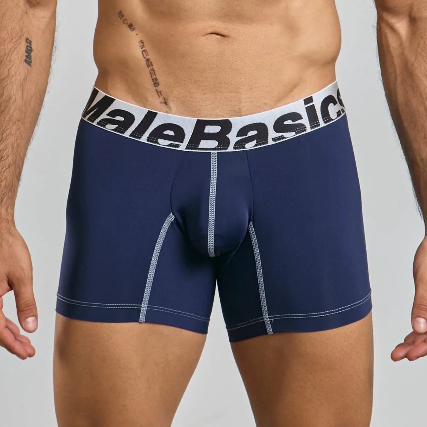 Men's mid-leg microfiber boxer brief in navy, front view on model