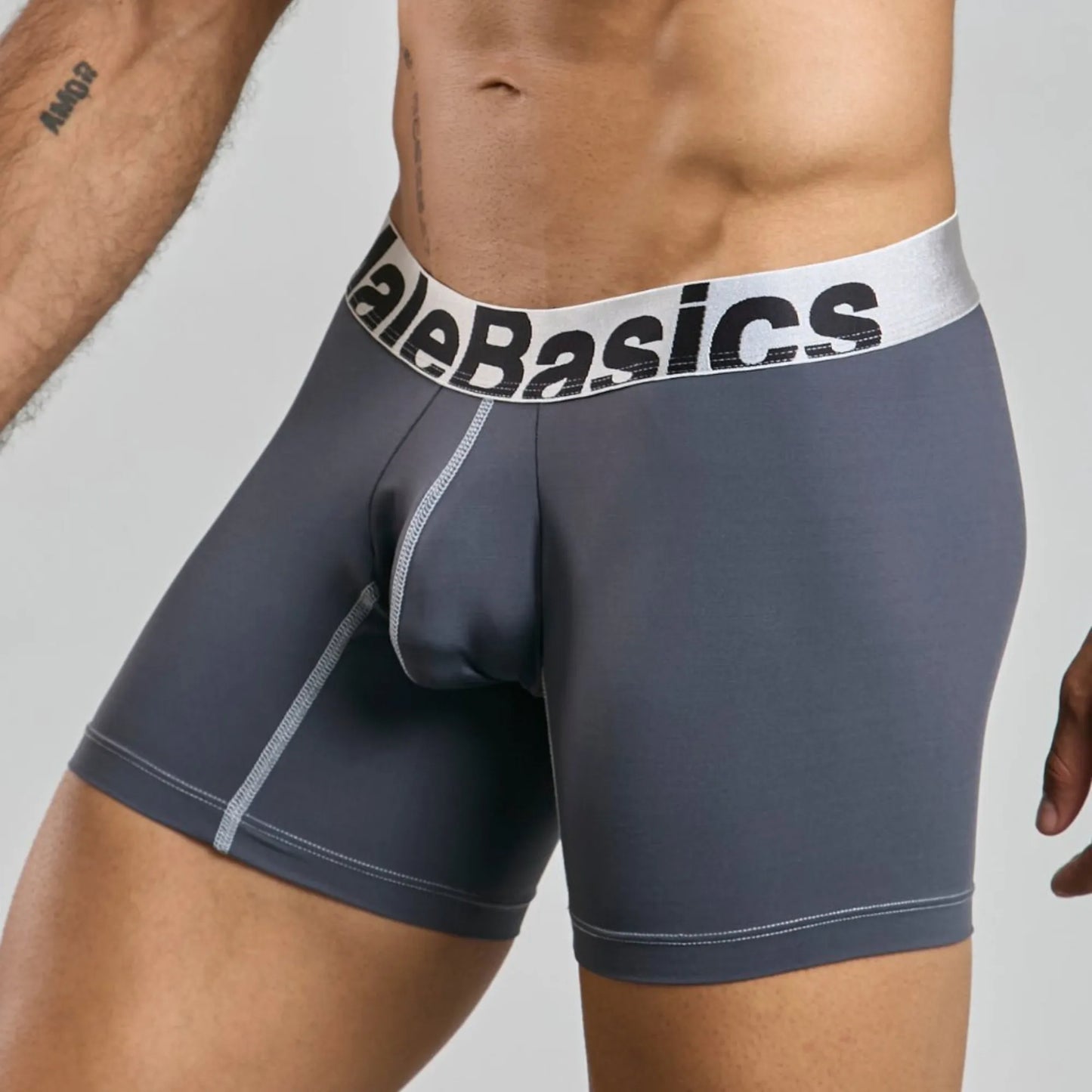 Men's mid-leg microfiber boxer brief in grey, three-quarter side view showing seam detail