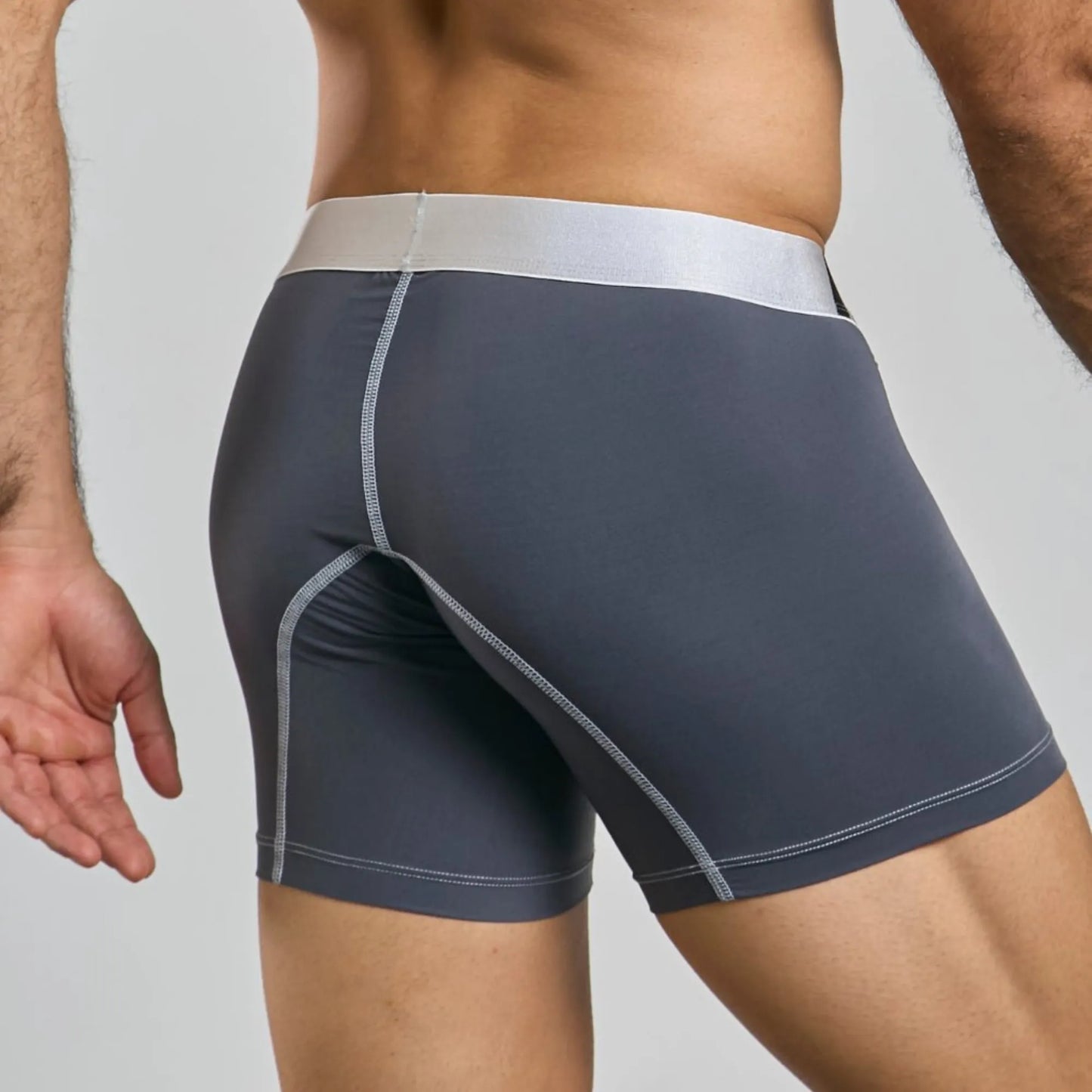 Men's mid-leg microfiber boxer brief in grey, back view on model