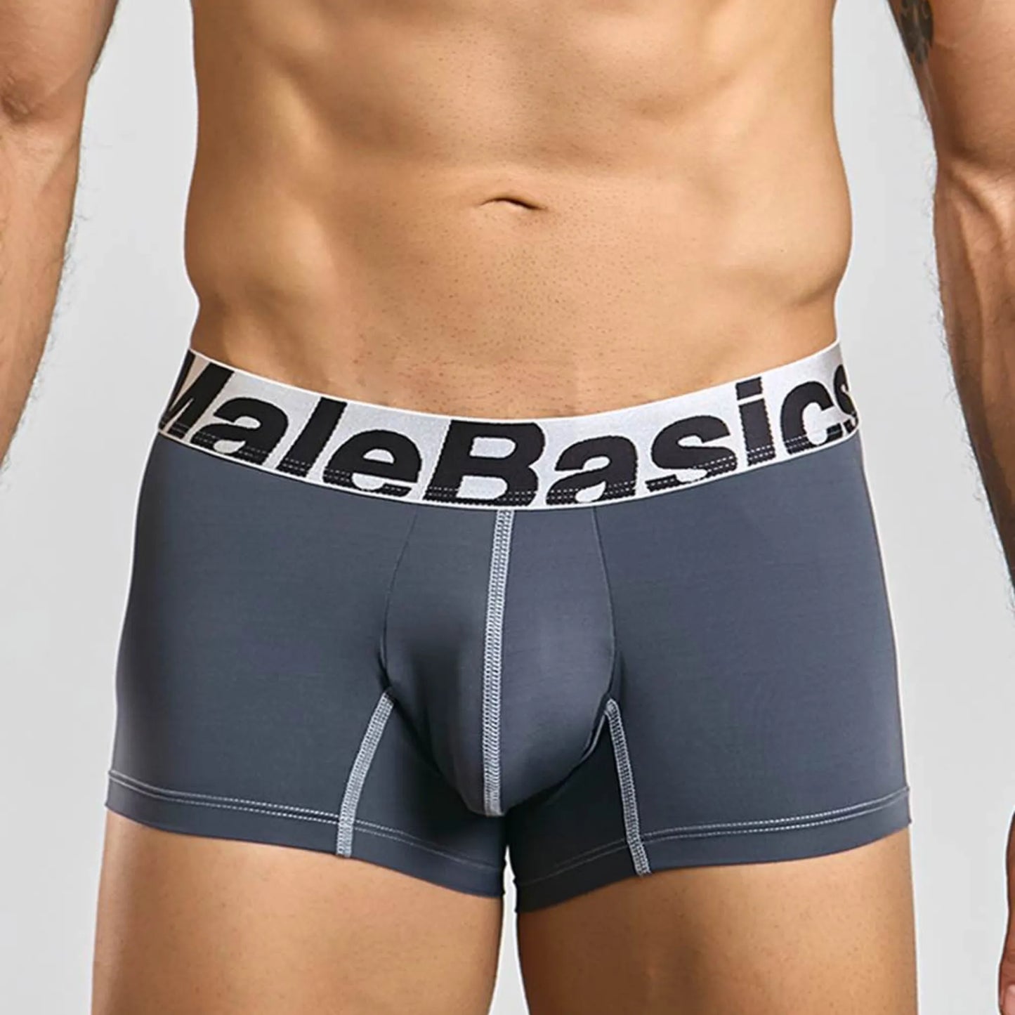 Men's performance microfiber boxer trunk in grey, front view on model