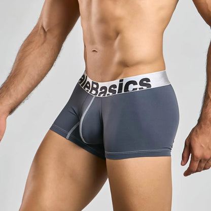 Men's performance microfiber boxer trunk in grey, three-quarter side view showing seam detail