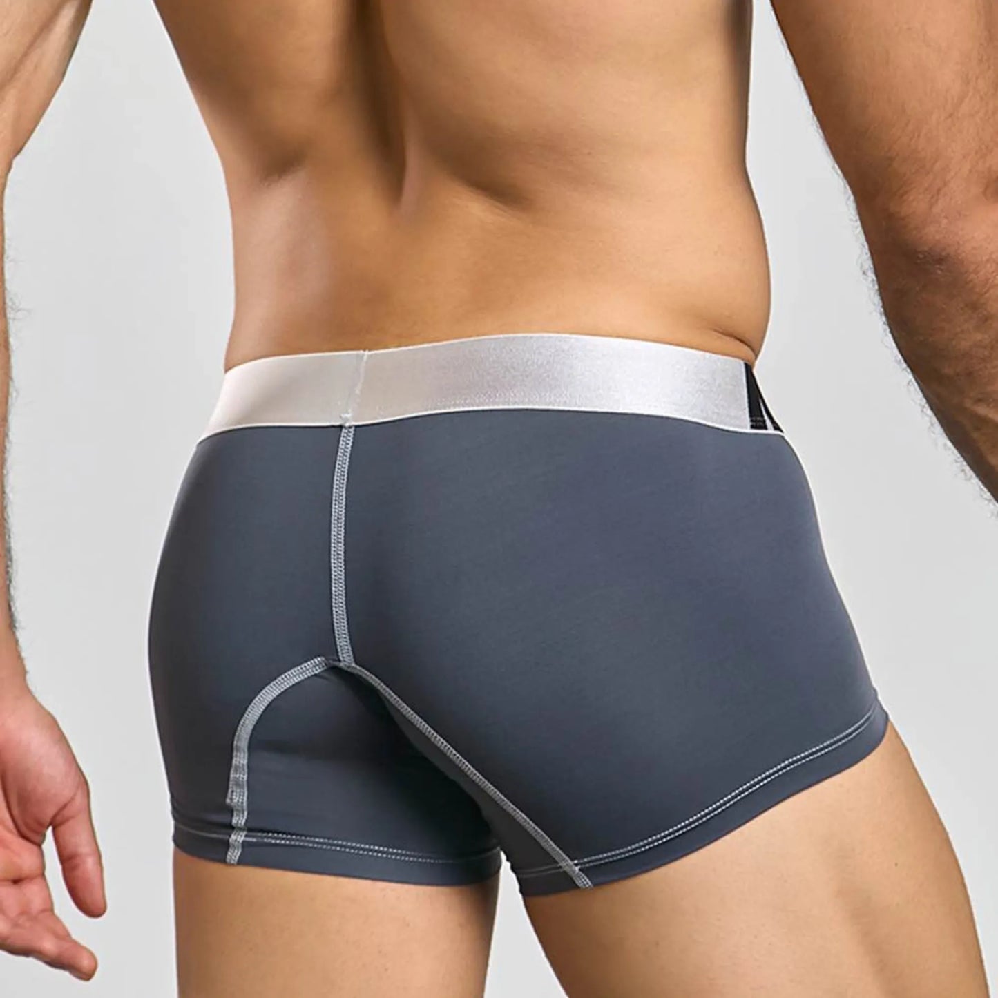 Men's performance microfiber boxer trunk in grey, back view on model