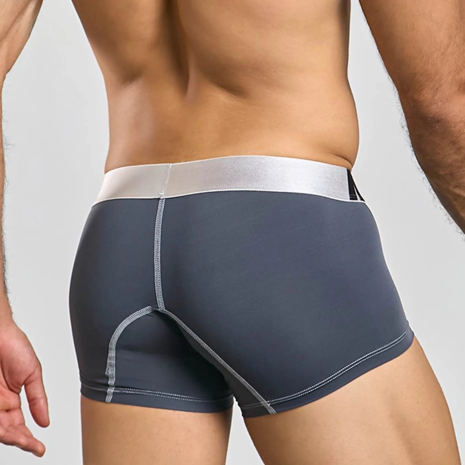 Men's performance microfiber boxer trunk in grey, back view on model