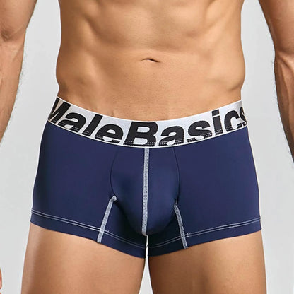 Men's performance microfiber boxer trunk in navy, front view on model