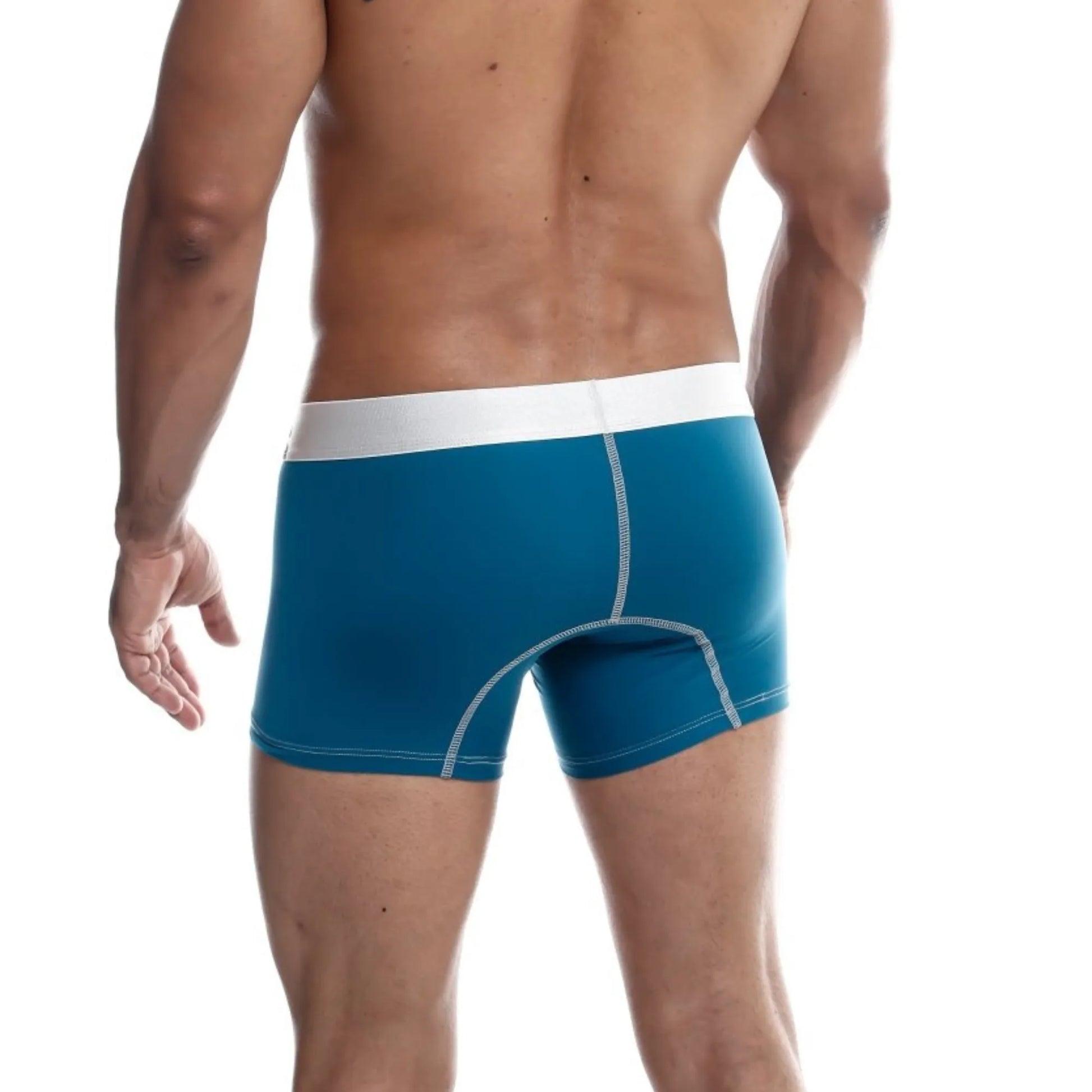 Men's performance microfiber boxer trunk in teal shown full-length on model, back view