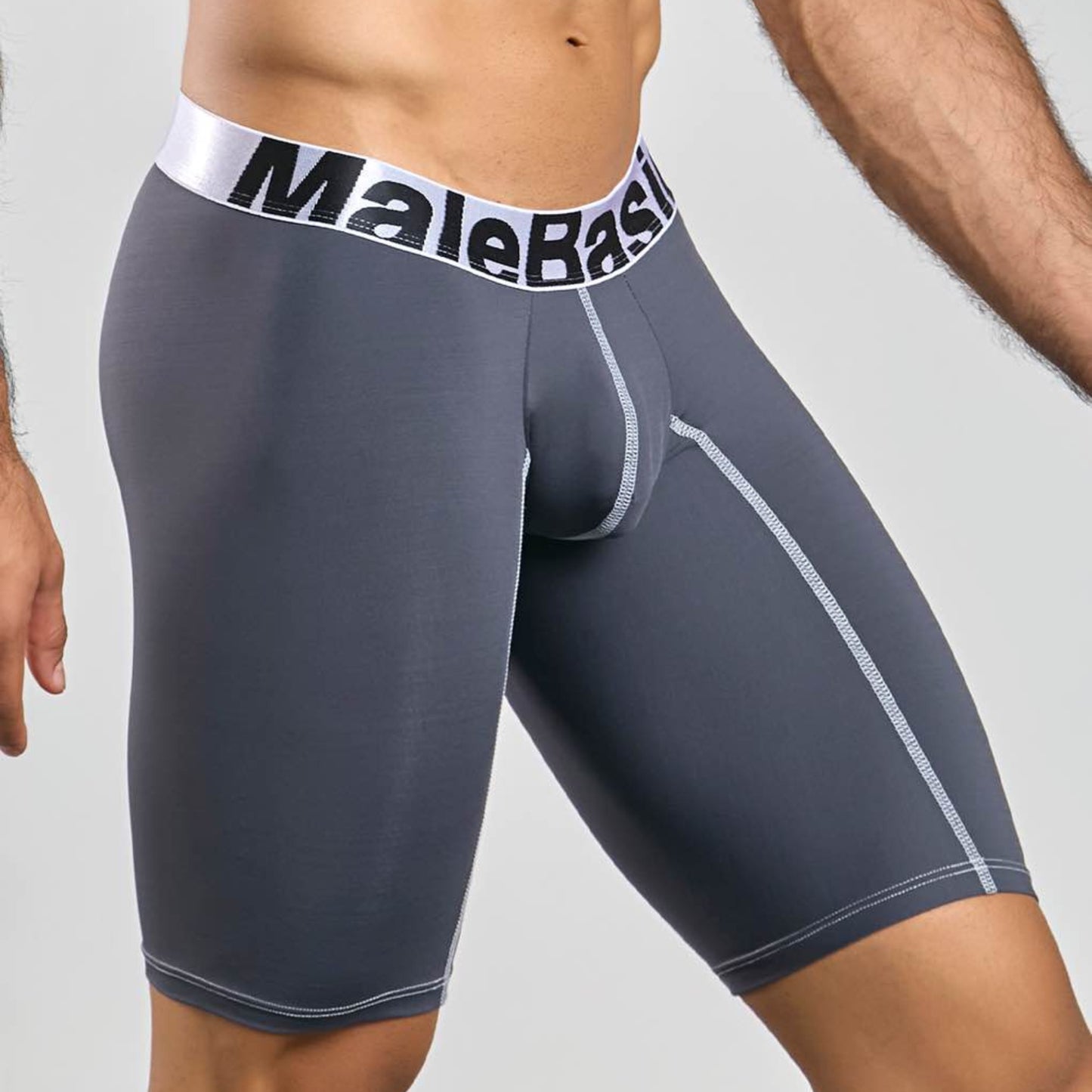 Men's active microfiber athletic boxer in grey, three-quarter side view showing seam detail
