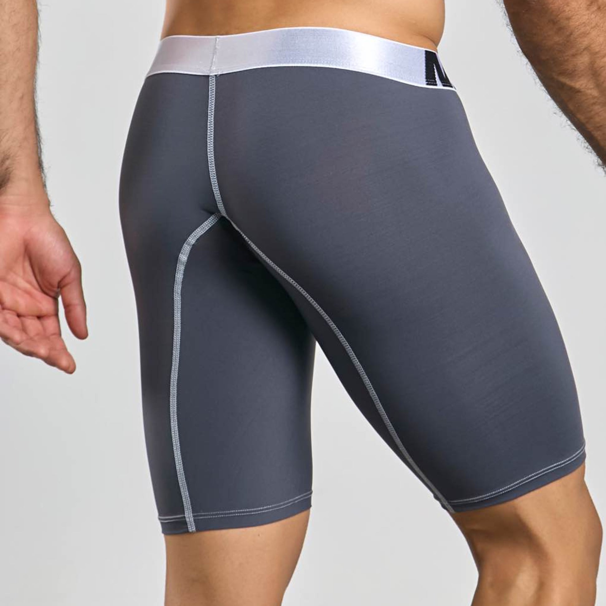 Men's active microfiber athletic boxer in grey, back view on model