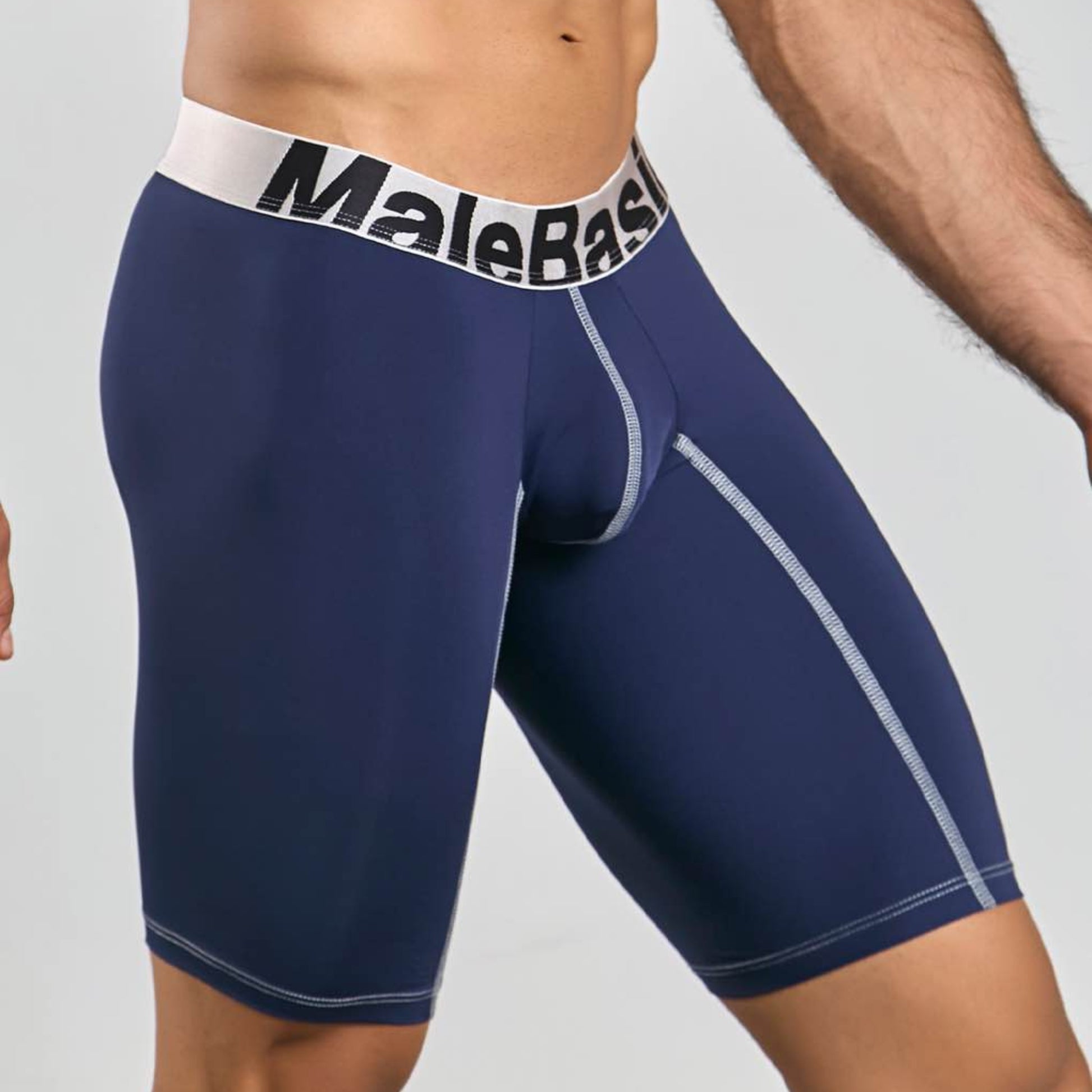 Men's active microfiber athletic boxer in navy, three-quarter side view
