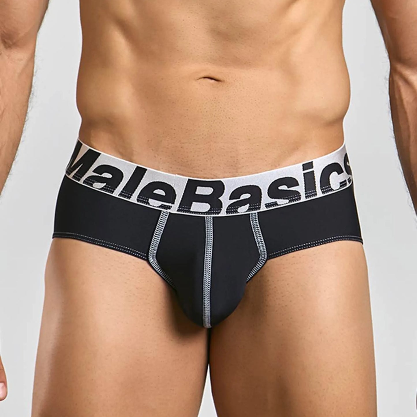 Men's stretch microfiber brief in black, front view on model