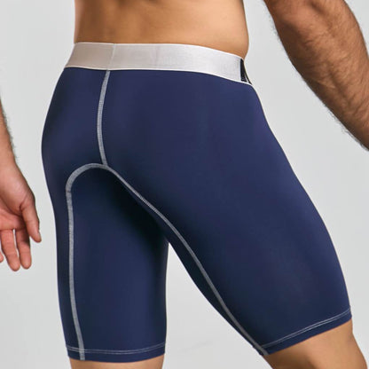 Men's active microfiber athletic boxer in navy, back view on model