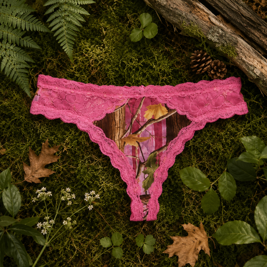 PinkWoods pink camo lace thong styled on moss and fallen autumn leaves